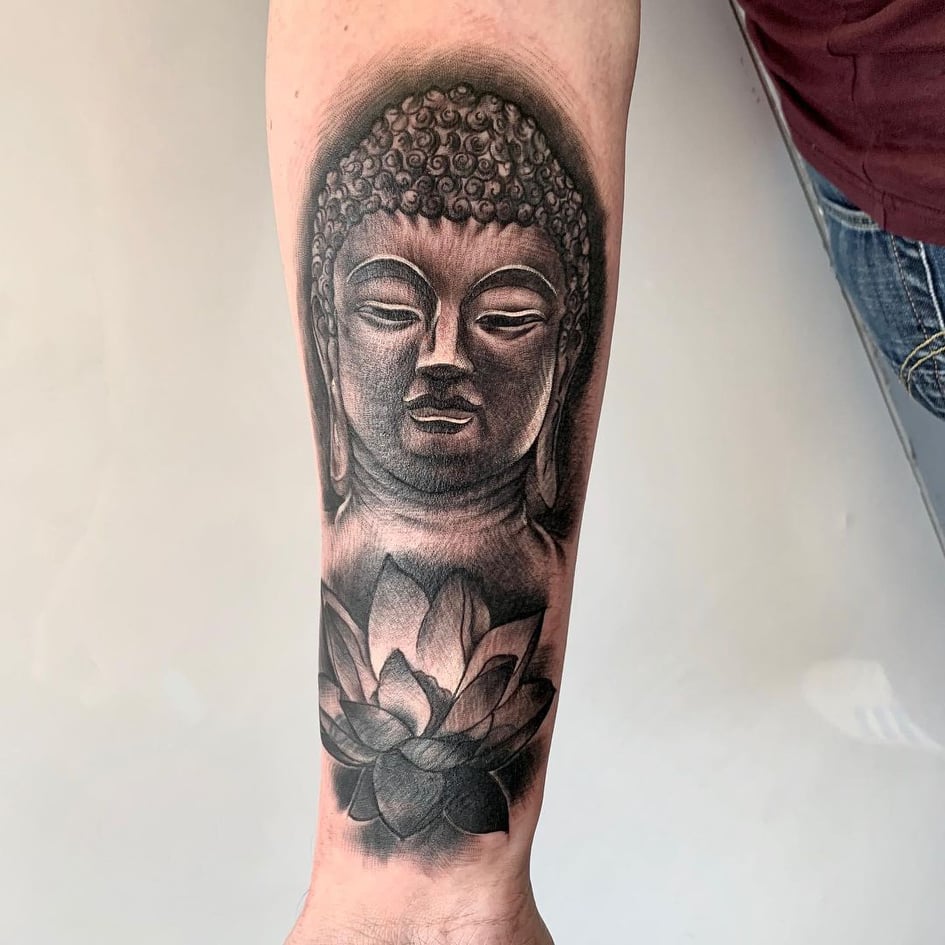 hand tattoos for men - buddha tattoo - The Dashing Man