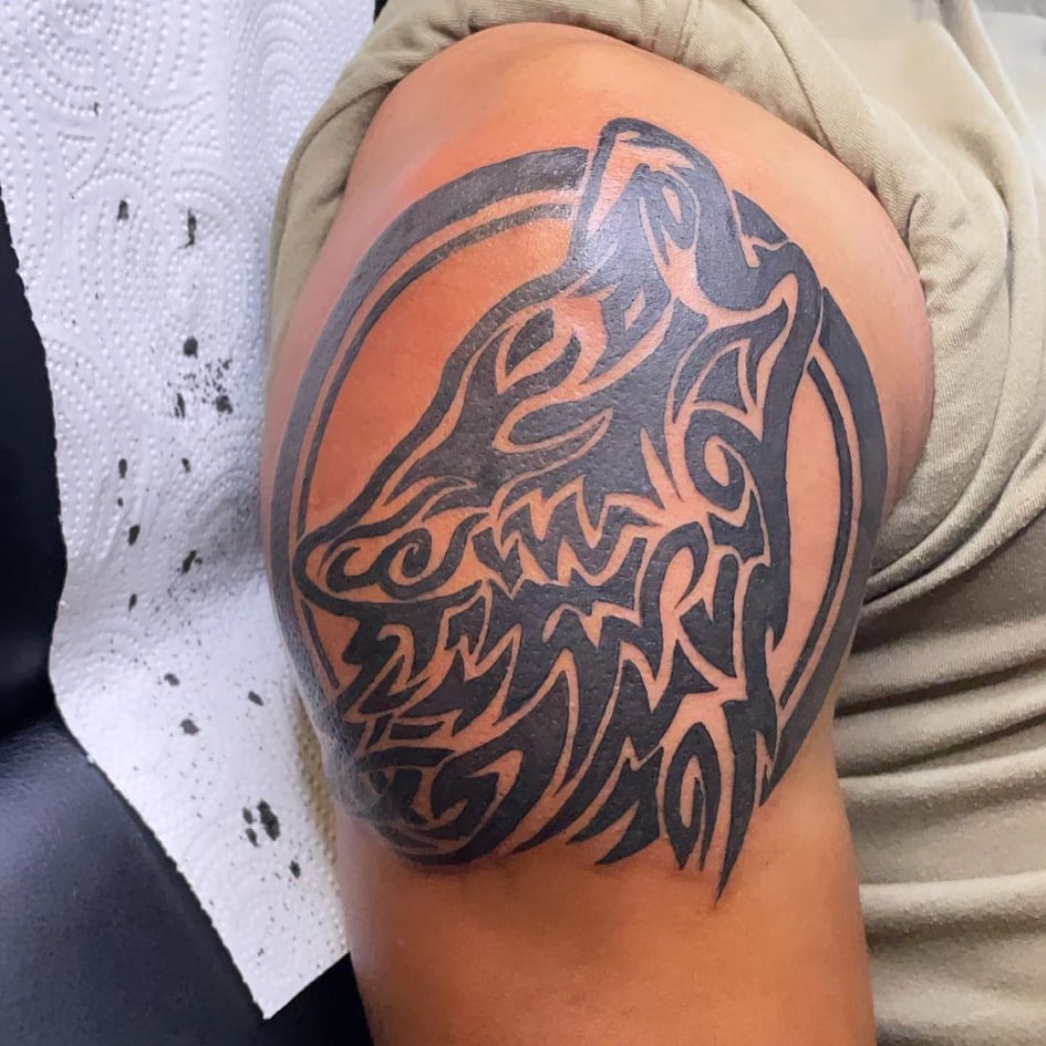 tribal tattoos - wolf Tattoo -The Dashing Man