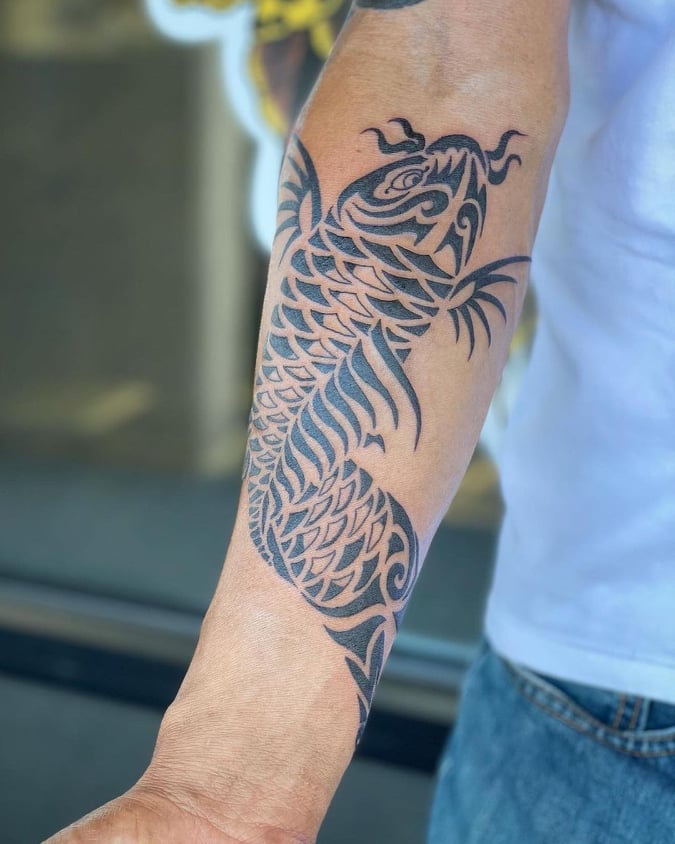tribal tattoos - fish Tattoo -The Dashing Man